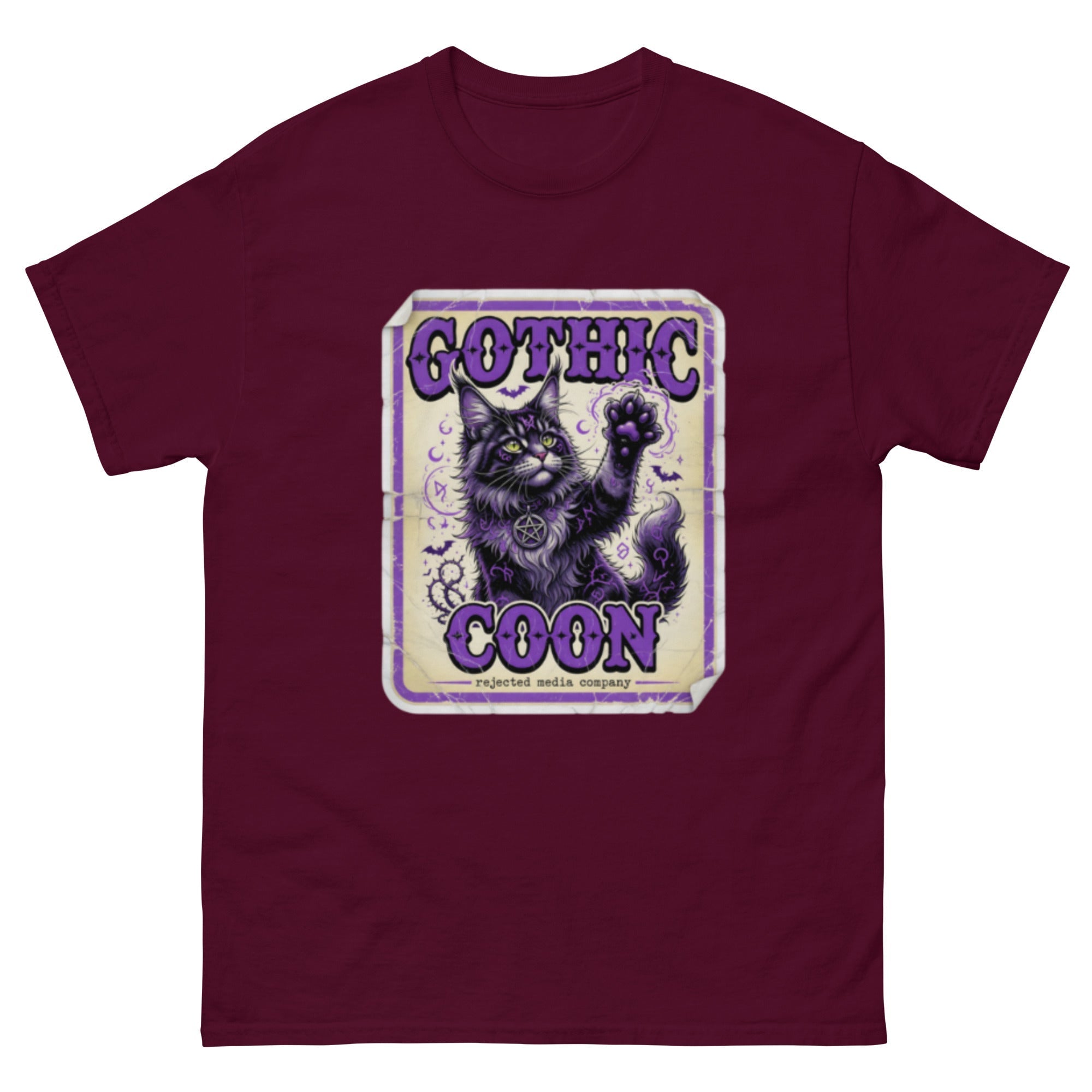 Gothic Coon tee — purple and black Maine Coon cat with a pentacle collar and one paw raised, vintage poster frame