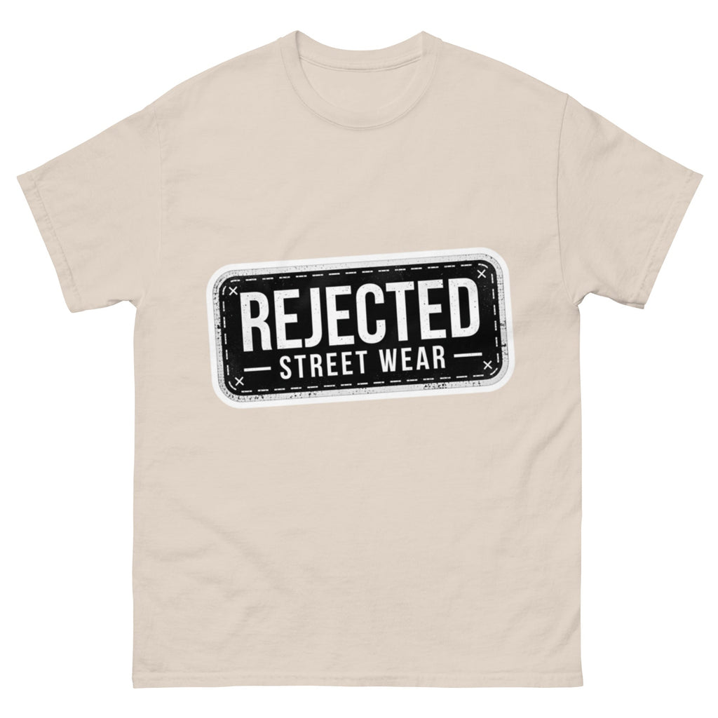 Rejected Street Wear plate logo tee — stamped black plate with a dashed border, corner x marks and REJECTED STREET WEAR inside