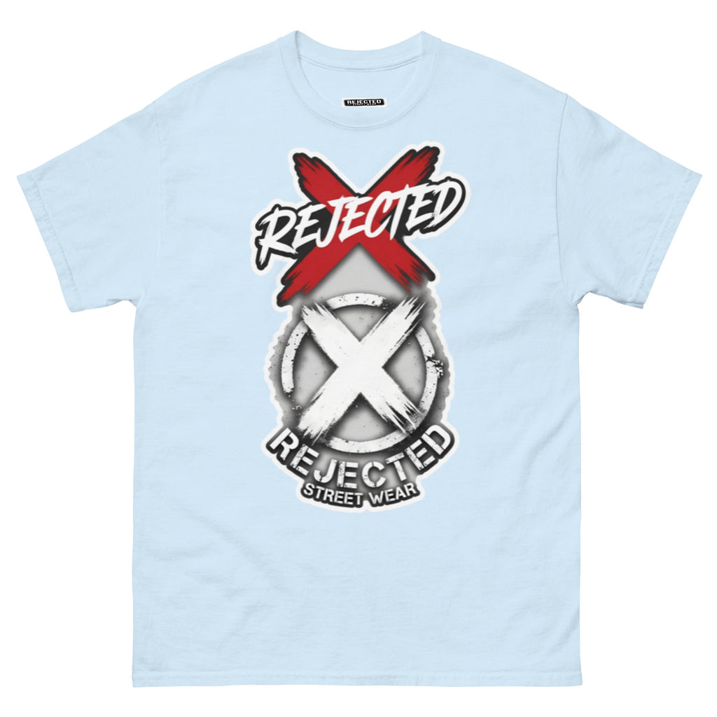 Reject Labels Be Human tee — REJECTED crossed out in red above the X emblem with the word Human underneath