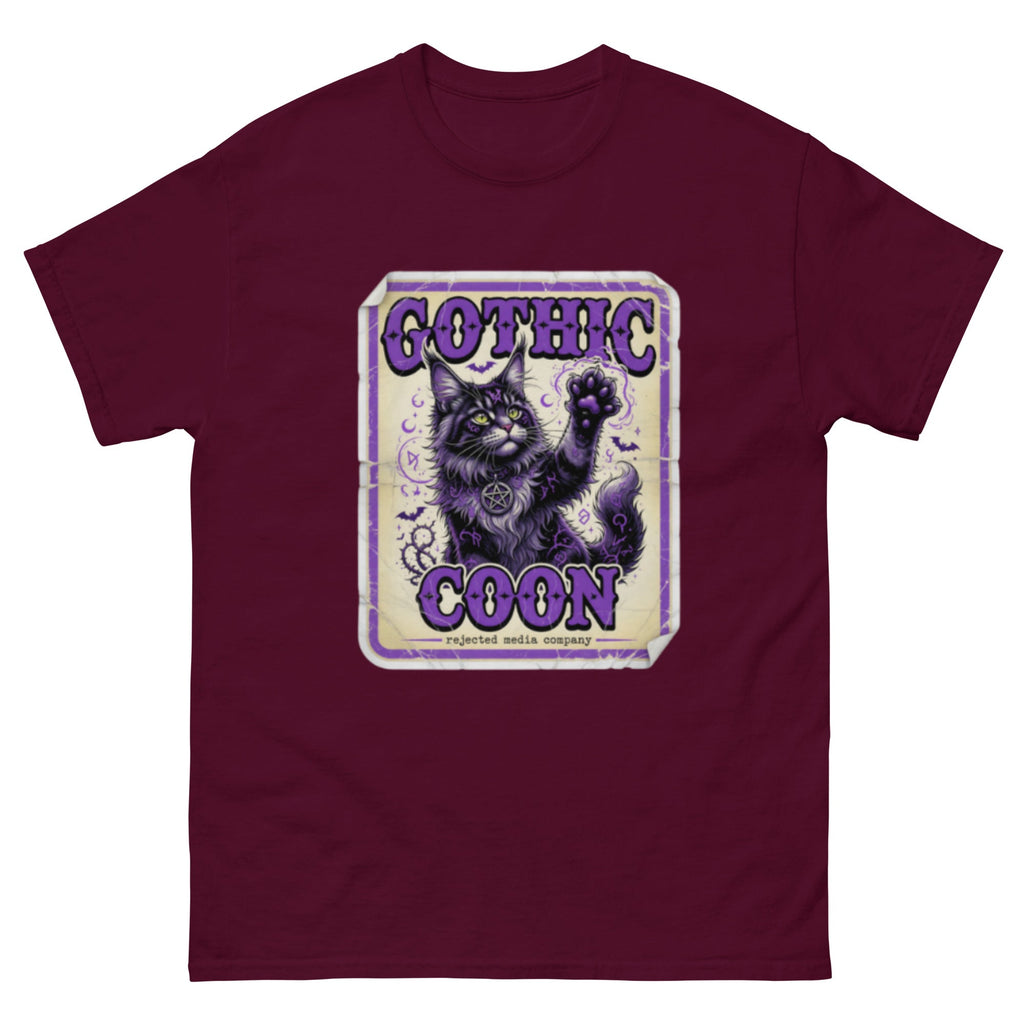 Gothic Coon tee — purple and black Maine Coon cat with a pentacle collar and one paw raised, vintage poster frame
