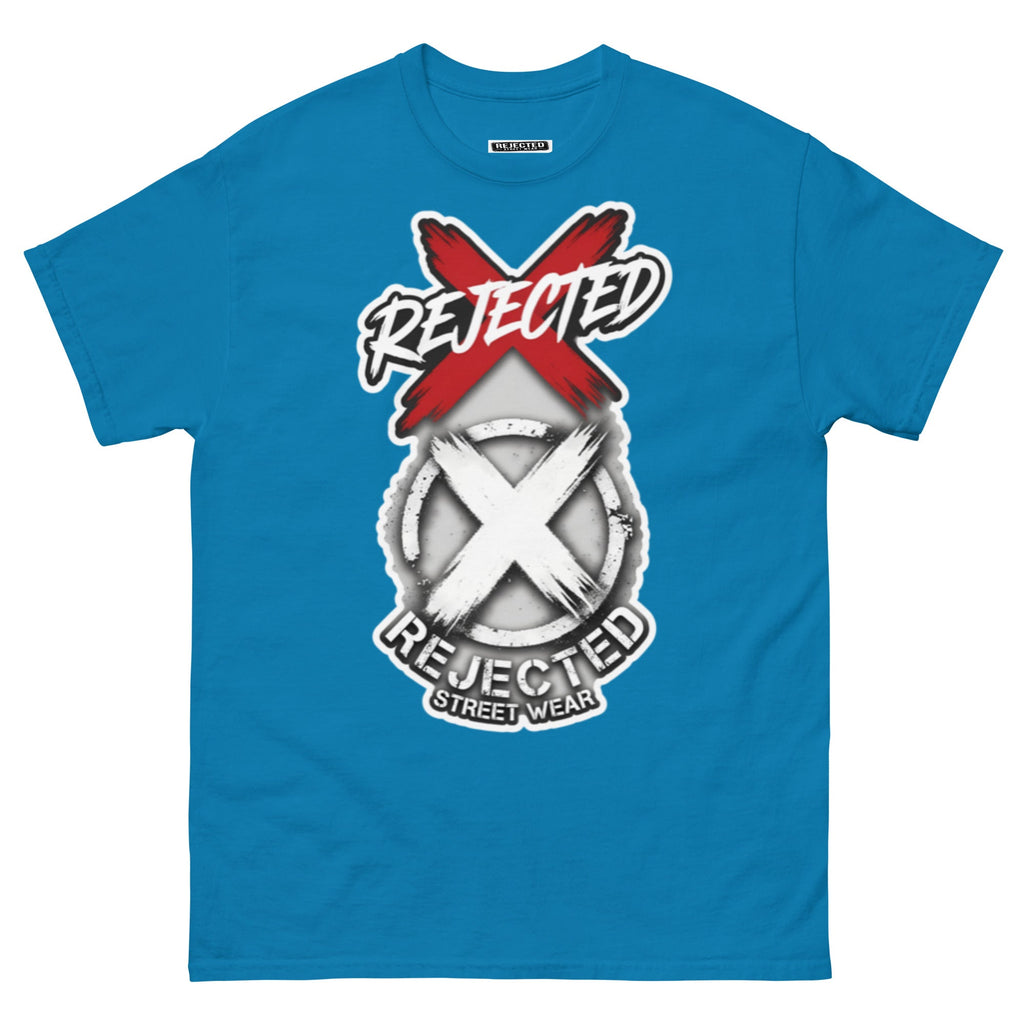 Reject Labels Be Human tee — REJECTED crossed out in red above the X emblem with the word Human underneath