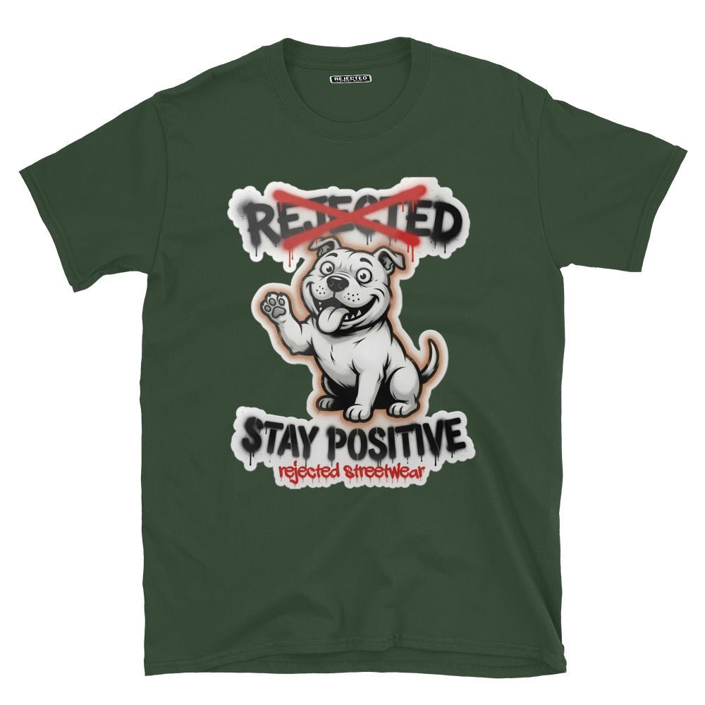 Stay Positive pit bull tee — white bully pup sitting with one paw raised, REJECTED crossed out in red
