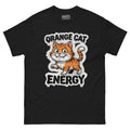 Orange Cat Energy tee — wide-eyed orange tabby mid-launch under drippy graffiti lettering
