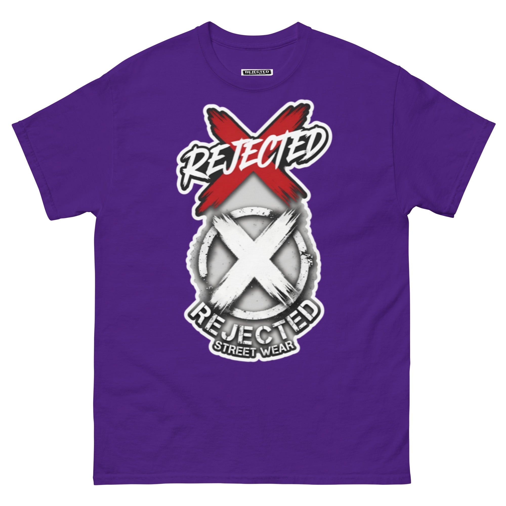 Reject Labels Be Human tee — REJECTED crossed out in red above the X emblem with the word Human underneath