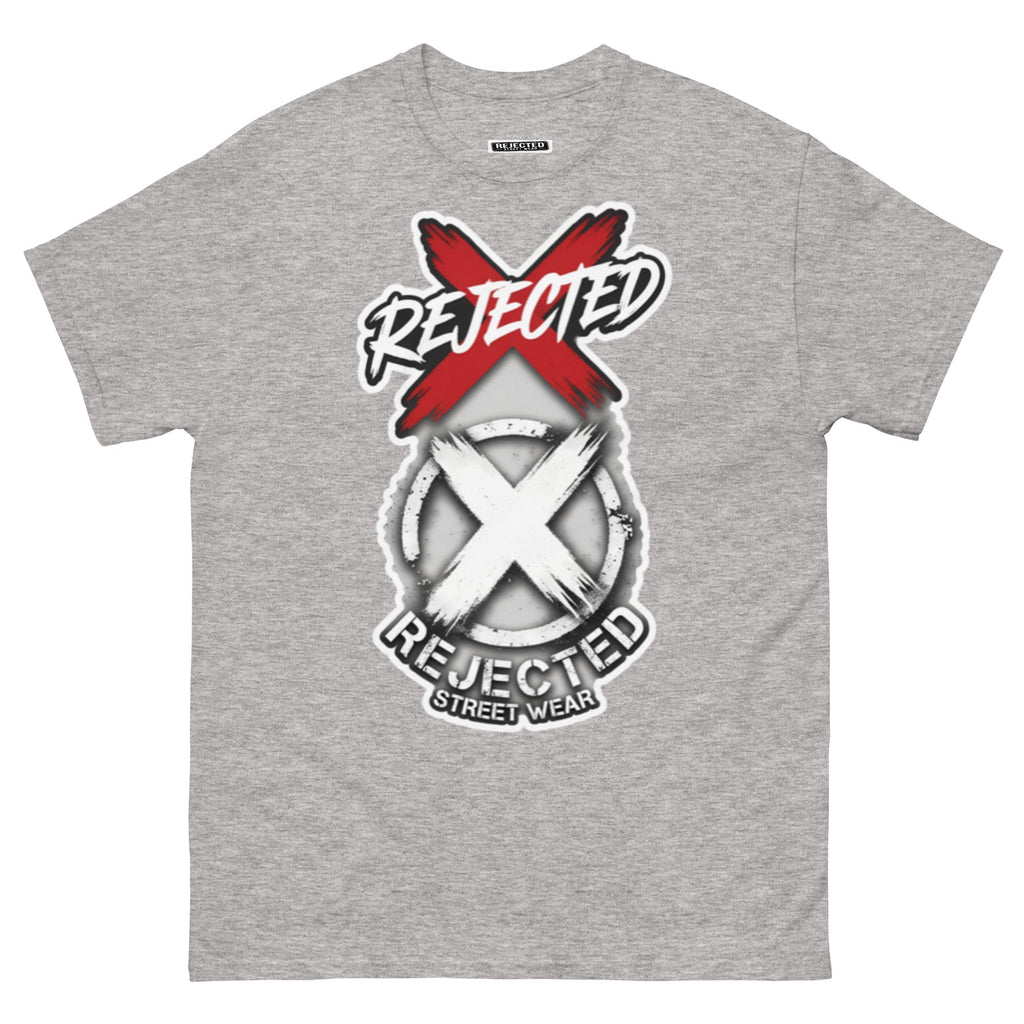 Reject Labels Be Human tee — REJECTED crossed out in red above the X emblem with the word Human underneath