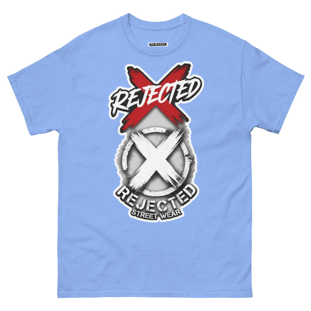 Reject Labels Be Human tee — REJECTED crossed out in red above the X emblem with the word Human underneath