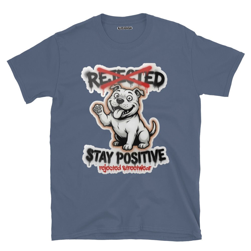 Stay Positive pit bull tee — white bully pup sitting with one paw raised, REJECTED crossed out in red
