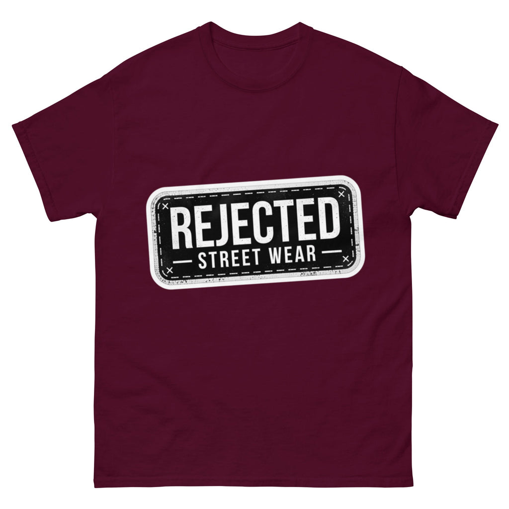 Rejected Street Wear plate logo tee — stamped black plate with a dashed border, corner x marks and REJECTED STREET WEAR inside