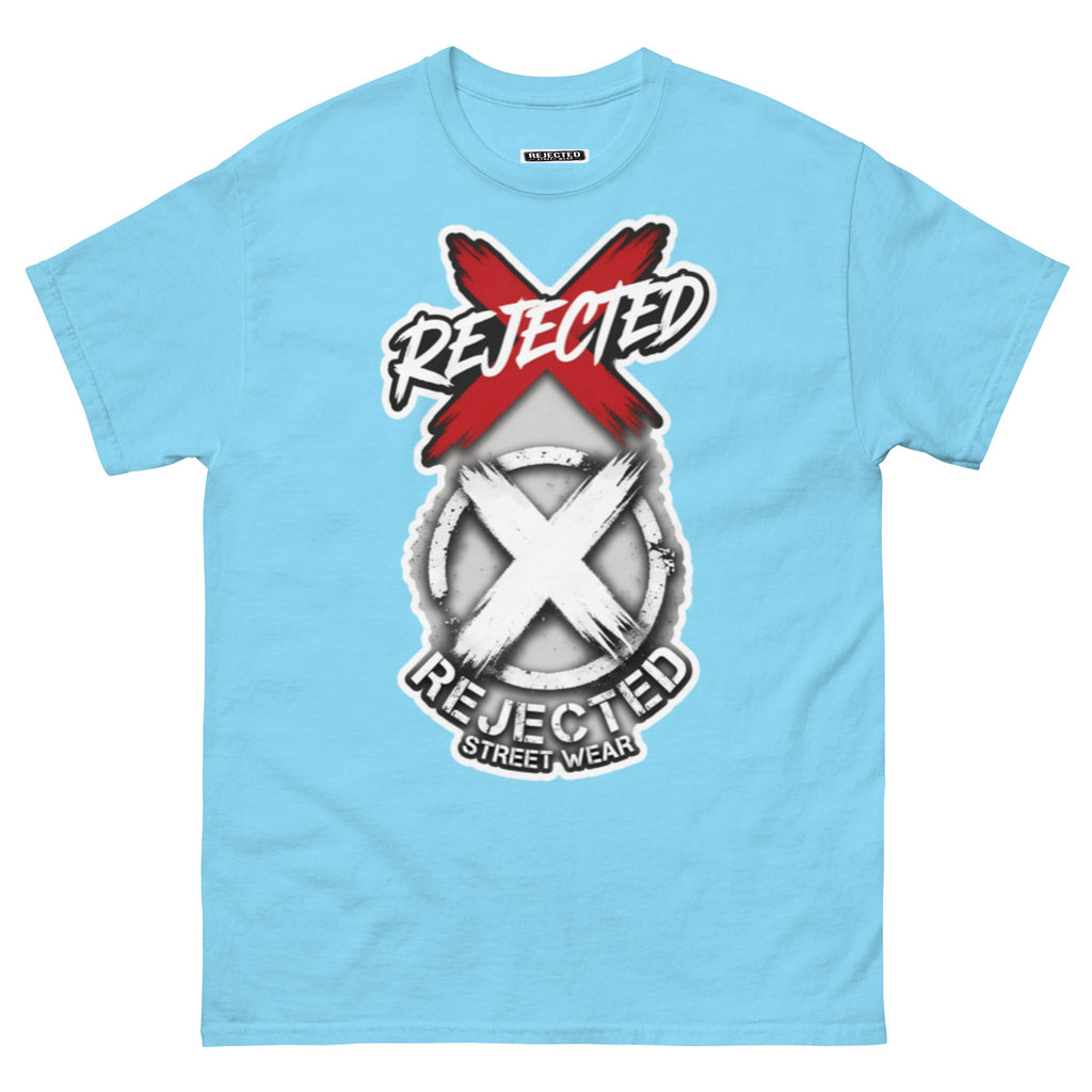 Reject Labels Be Human tee — REJECTED crossed out in red above the X emblem with the word Human underneath