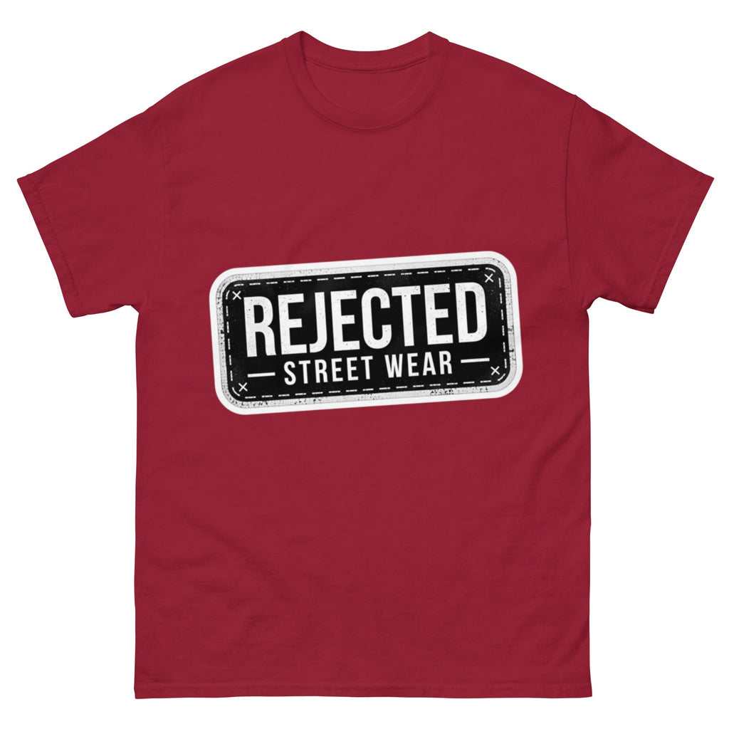 Rejected Street Wear plate logo tee — stamped black plate with a dashed border, corner x marks and REJECTED STREET WEAR inside