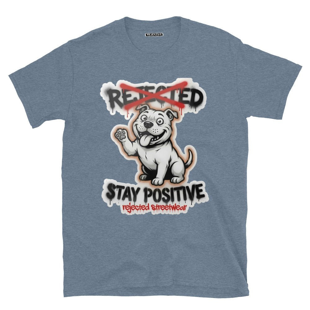 Stay Positive pit bull tee — white bully pup sitting with one paw raised, REJECTED crossed out in red