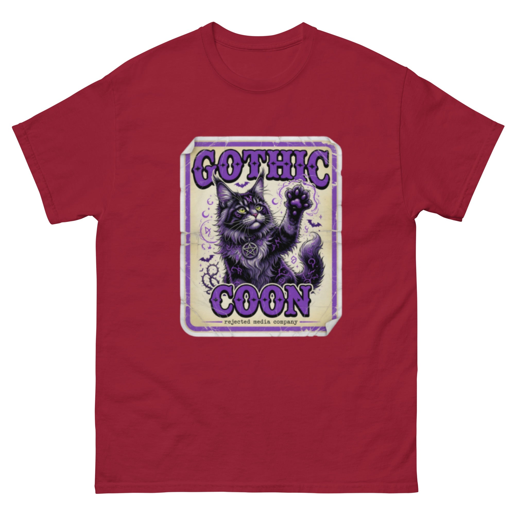 Gothic Coon tee — purple and black Maine Coon cat with a pentacle collar and one paw raised, vintage poster frame