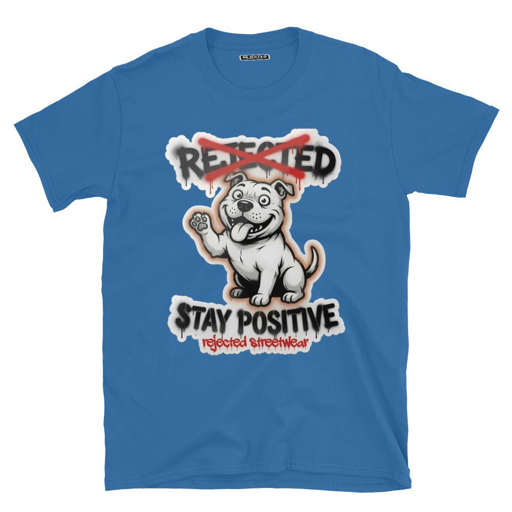 Stay Positive pit bull tee — white bully pup sitting with one paw raised, REJECTED crossed out in red