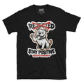 Stay Positive pit bull tee — white bully pup sitting with one paw raised, REJECTED crossed out in red